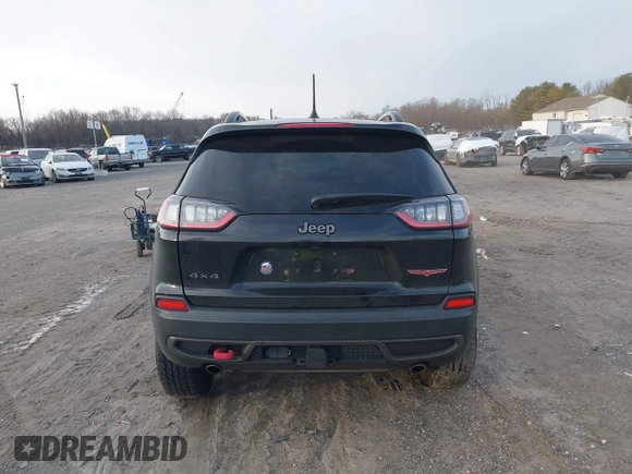 2022 Jeep Cherokee Trailhawk with VIN 1C4PJMBX0ND548397, listed as a IAAI auction lot 41240303 with 54,055 mi miles. Bid and sale history available at carsss.com. Image 16.