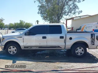 2014 Ford F-150 XL with VIN 1FTFW1CT3EKD12216, listed as a IAAI auction lot 42110775 with 140,673 mi miles. Bid and sale history available at carsss.com. Image 14.