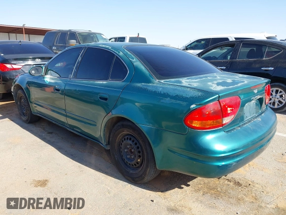1999 Oldsmobile Alero GL z VIN 1G3NL52T0XC354966, wystawiony jako IAAI lot #42259258 z przebiegiem Nie podano mil oraz . Historia ofert i sprzedaży dostępna na DreamBid. Obrazek 3.