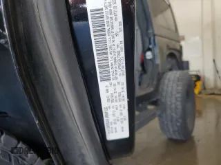 2009 Jeep Wrangler Sahara with VIN 1J4FA54159L772622, listed as a Copart auction lot 55648305 with 141,880 mi miles and Salvage title. Bid and sale history available at DreamBid. Image 12.