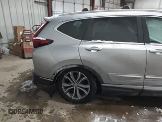 2020 Honda CR-V Touring with VIN 7FARW2H96LE000275, listed as a IAAI auction lot 41600759 with 78,078 mi miles and . Bid and sale history available at DreamBid. Image 6.