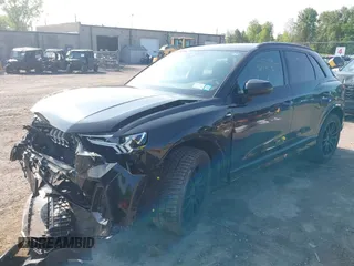 2021 Audi Q3 S line Premium Plus z VIN WA1EECF38M1111853, wystawiony jako IAAI lot #42367677 z przebiegiem 53 681 mil mil oraz . Historia ofert i sprzedaży dostępna na DreamBid. Obrazek 2.