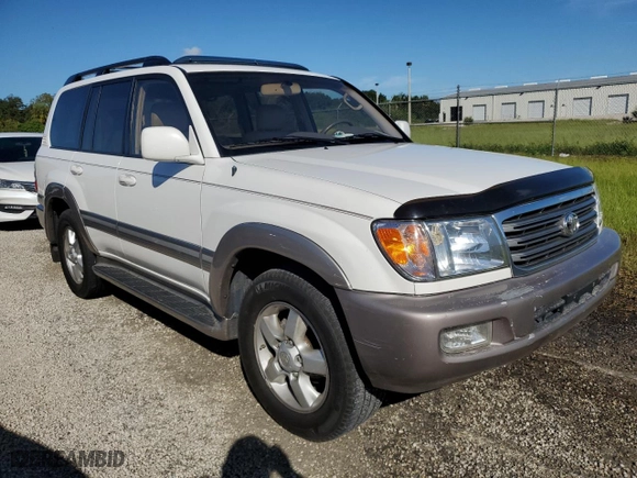 2003 Toyota Land Cruiser with VIN JTEHT05J932033529, listed as a Copart auction lot 73855214 with 0 mi miles and Salvage Title. Bid and sale history available at carsss.com. Image 4.
