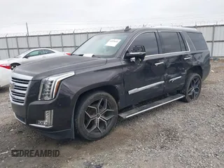 2016 Cadillac Escalade Platinum z VIN 1GYS4DKJ1GR363238, wystawiony jako IAAI lot #40974636 z przebiegiem 128 296 mil mil oraz . Historia ofert i sprzedaży dostępna na DreamBid. Obrazek 17.