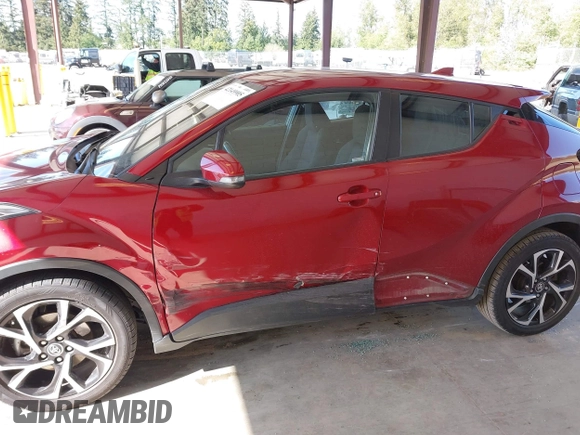 2018 Toyota C-HR XLE with VIN NMTKHMBX6JR027381, listed as a IAAI auction lot 42149905 with 118,897 mi miles and . Bid and sale history available at DreamBid. Image 6.