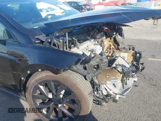 2023 Tesla Model X with VIN 7SAXCDE59PF430836, listed as a IAAI auction lot 41545267 with Not Provided miles and . Bid and sale history available at DreamBid. Image 6.