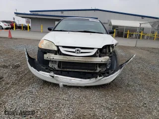 2002 Honda Civic LX with VIN 1HGEM21502L108055, listed as a Copart auction lot 73056704 with 253,586 mi miles and Salvage Title. Bid and sale history available at carsss.com. Image 5.