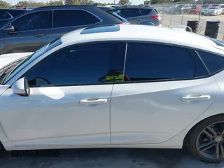 2023 Acura Integra w/A-Spec Package z VIN 19UDE4H30PA001566, wystawiony jako IAAI lot #41771223 z przebiegiem 21 343 mil mil oraz . Historia ofert i sprzedaży dostępna na DreamBid. Obrazek 14.