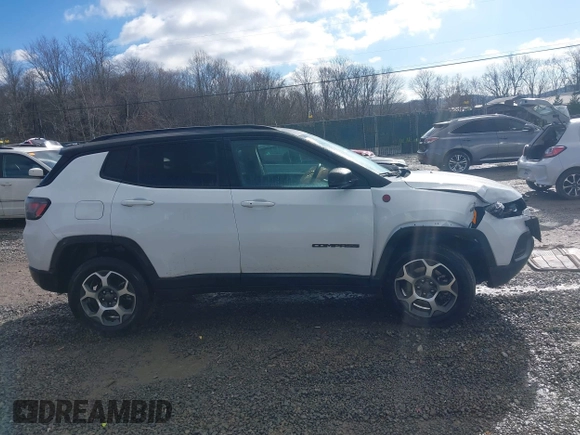 2022 Jeep Compass Trailhawk z VIN 3C4NJDDB7NT226018, wystawiony jako IAAI lot #40929794 z przebiegiem 25 702 mil mil oraz . Historia ofert i sprzedaży dostępna na DreamBid. Obrazek 13.