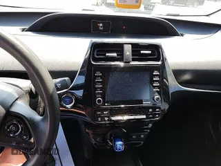 2021 Toyota Prius L Eco with VIN JTDKAMFU4M3144050, listed as a IAAI auction lot 42774220 with 173,180 mi miles and . Bid and sale history available at DreamBid. Image 1.