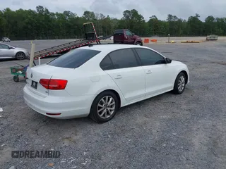 2015 Volkswagen Jetta Sport z VIN 3VWD17AJ9FM294449, wystawiony jako IAAI lot #42507227 z przebiegiem 154 277 mil mil oraz . Historia ofert i sprzedaży dostępna na DreamBid. Obrazek 4.