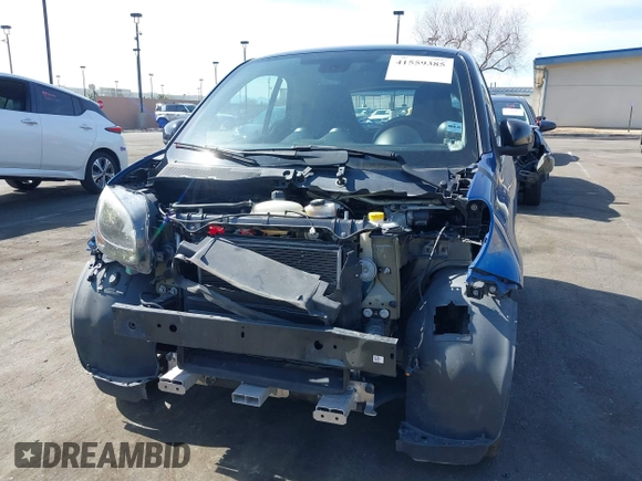2016 Smart fortwo Passion z VIN WMEFJ5DA4GK067126, wystawiony jako IAAI lot #41559385 z przebiegiem 79 540 mil mil oraz . Historia ofert i sprzedaży dostępna na DreamBid. Obrazek 6.