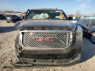 2016 GMC Yukon XL Denali with VIN 1GKS1HKJXGR443700, listed as a Copart auction lot 85327284 with 115,015 mi miles and Salvage Title. Bid and sale history available at carsss.com. Image 5.