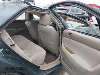 2002 Toyota Camry XLE z VIN 4T1BF32K02U522335, wystawiony jako IAAI lot #42037459 z przebiegiem 214 832 mil mil oraz . Historia ofert i sprzedaży dostępna na DreamBid. Obrazek 8.