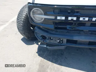 2022 Ford Bronco with VIN 1FMEE5DP6NLB34962, listed as a IAAI auction lot 42432037 with 101,044 mi miles and . Bid and sale history available at DreamBid. Image 6.