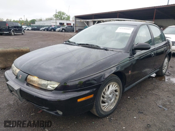 1999 Saturn SL with VIN 1G8ZK5272XZ263163, listed as a IAAI auction lot 42180002 with 138,463 mi miles. Bid and sale history available at carsss.com. Image 2.