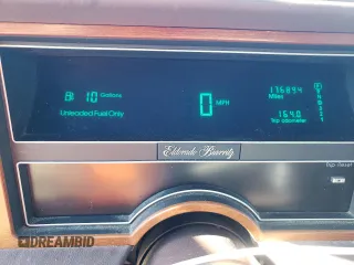 1988 Cadillac Eldorado with VIN 1G6EL1153JU632470, listed as a Copart auction lot 78507684 with 176,894 mi miles and Salvage Title. Bid and sale history available at DreamBid. Image 9.