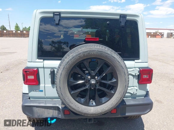 2023 Jeep Wrangler Sahara with VIN 1C4JJXP68PW627007, listed as a IAAI auction lot 42474745 with 57,912 mi miles and . Bid and sale history available at DreamBid. Image 16.