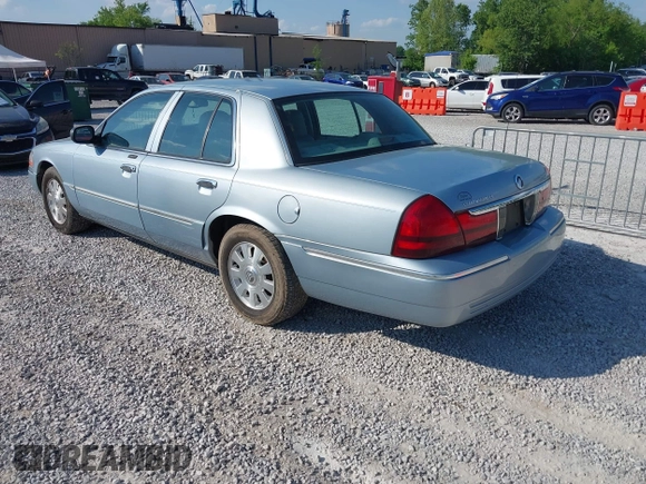 2005 Mercury Grand Marquis LS Premium z VIN 2MEFM75W15X621971, wystawiony jako IAAI lot #42130811 z przebiegiem 129 700 mil mil oraz . Historia ofert i sprzedaży dostępna na DreamBid. Obrazek 3.