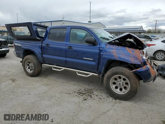 2014 Toyota Tacoma with VIN 5TFLU4EN7EX106909, listed as a Copart auction lot 46906235 with 102,681 mi miles and Salvage Title. Bid and sale history available at DreamBid. Image 4.