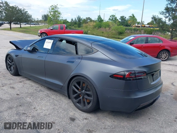 2023 Tesla Model S with VIN 5YJSA1E54PF501565, listed as a IAAI auction lot 42244953 with Not provided miles and . Bid and sale history available at DreamBid. Image 3.