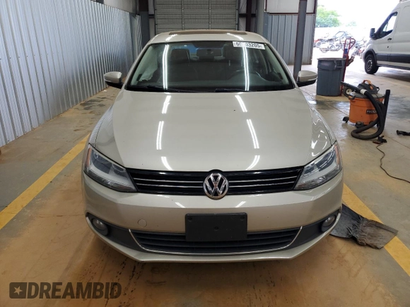 2014 Volkswagen Jetta TDI w/Premium with VIN 3VWLL7AJ9EM261908, listed as a Copart auction lot 60703205 with 128,892 mi miles and Salvage title. Bid and sale history available at DreamBid. Image 5.