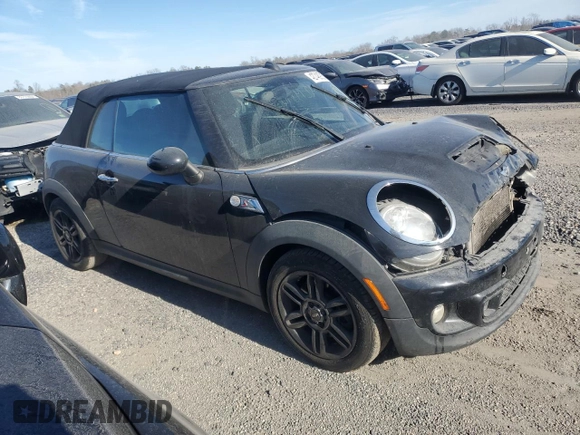 2015 MINI Convertible S with VIN WMWZP3C58F2A91317, listed as a Copart auction lot 42748905 with 164,932 mi miles and Salvage title. Bid and sale history available at DreamBid. Image 4.