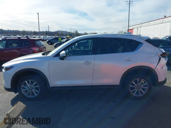 2023 Mazda CX-5 2.5 S Select Package with VIN JM3KFBBM9P0142478, listed as a IAAI auction lot 41724596 with 9,518 mi miles. Bid and sale history available at carsss.com. Image 15.