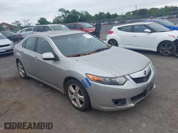 2010 Acura TSX z VIN JH4CU2F61AC005537, wystawiony jako IAAI lot #42241748 z przebiegiem 307 771 mil mil oraz . Historia ofert i sprzedaży dostępna na DreamBid. Obrazek 1.