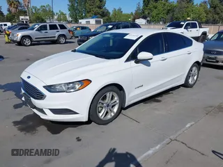 2018 Ford Fusion S z VIN 3FA6P0UU5JR122606, wystawiony jako IAAI lot #42239394 z przebiegiem 88 148 mil mil oraz . Historia ofert i sprzedaży dostępna na DreamBid. Obrazek 19.