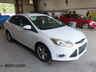 2013 Ford Focus SE z VIN 1FADP3F23DL193309, wystawiony jako IAAI lot #42836797 z przebiegiem 87 094 mil mil oraz . Historia ofert i sprzedaży dostępna na DreamBid. Obrazek 1.