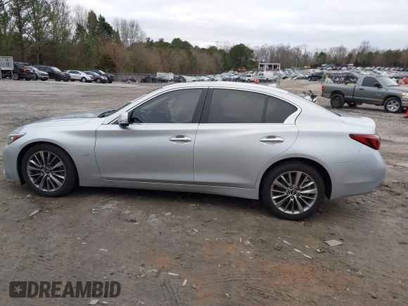 2019 Infiniti Q50 3.0t LUXE with VIN JN1EV7AP1KM519553, listed as a IAAI auction lot 41265684 with 84,120 mi miles. Bid and sale history available at carsss.com. Image 14.