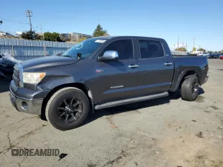 2012 Toyota Tundra with VIN 5TFEM5F10CX038623, listed as a Copart auction lot 77453564 with 226,808 mi miles and Salvage title. Bid and sale history available at DreamBid. Image 1.