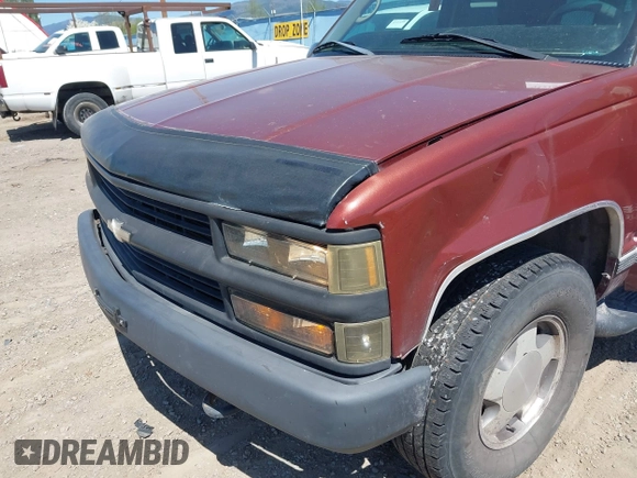 1999 Chevrolet Tahoe Z71 with VIN 1GNEK13R4XJ341736, listed as a IAAI auction lot 42218712 with 282,663 mi miles and . Bid and sale history available at DreamBid. Image 6.