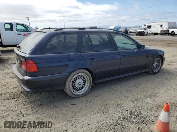 2000 BMW 5 Series 528iAt with VIN WBADP634XYBV64797, listed as a Copart auction lot 71316904 with 163,267 mi miles and Salvage Title. Bid and sale history available at carsss.com. Image 3.