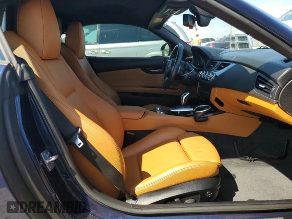 2011 BMW Z4 sDrive35is with VIN WBALM1C56BE393858, listed as a Copart auction lot 74249954 with Not provided miles and Salvage title. Bid and sale history available at DreamBid. Image 10.
