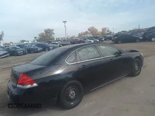 2011 Chevrolet Impala Police Police with VIN 2G1WD5EM0B1223713, listed as a IAAI auction lot 34669220 with 143,859 mi miles. Bid and sale history available at carsss.com. Image 4.