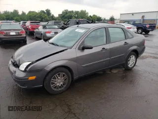 2007 Ford Focus S with VIN 1FAHP34N07W177912, listed as a Copart auction lot 60481025 with 114,086 mi miles and Salvage title. Bid and sale history available at DreamBid. Image 1.