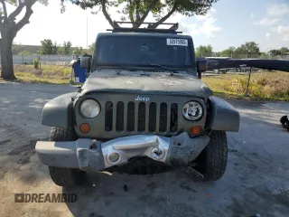 2008 Jeep Wrangler Unlimited Sahara with VIN 1J4GA59198L566019, listed as a Copart auction lot 53975965 with 184,612 mi miles and Salvage Title. Bid and sale history available at carsss.com. Image 5.