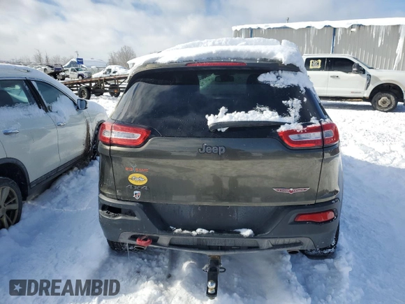 2014 Jeep Cherokee Trailhawk with VIN 1C4PJMBS2EW310818, listed as a Copart auction lot 44581755 with 105,560 mi miles and Non repairable. Bid and sale history available at DreamBid. Image 6.