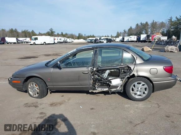 2000 Saturn SL z VIN 1G8ZK5275YZ244530, wystawiony jako IAAI lot #41784896 z przebiegiem 50 332 mil mil oraz . Historia ofert i sprzedaży dostępna na DreamBid. Obrazek 6.