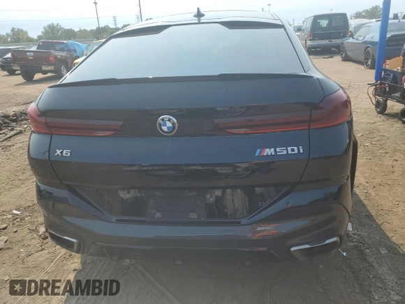 2021 BMW X6 M50i with VIN 5UXCY8C04M9E36899, listed as a Copart auction lot 68819334 with 72,808 mi miles and Salvage Title. Bid and sale history available at carsss.com. Image 6.