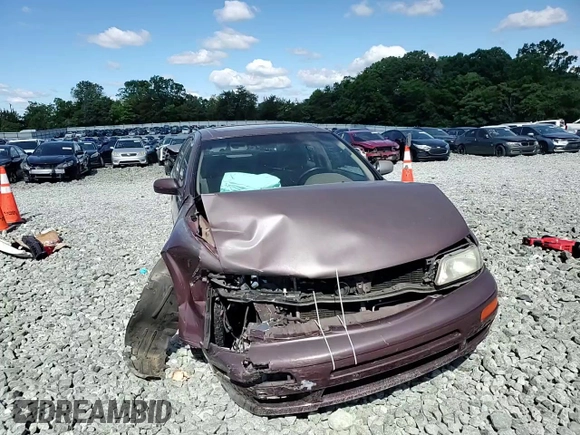 1998 Nissan Maxima GXE с VIN JN1CA21D7WM901362, выставлен на аукционе Copart как лот 58243765 с пробегом Не указан миль и Списание • Salvage title. История ставок и продаж доступна на DreamBid. Изображение 13.