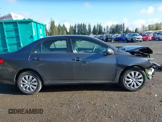 2013 Toyota Corolla L with VIN 2T1BU4EE3DC030761, listed as a IAAI auction lot 42004033 with 90,733 mi miles. Bid and sale history available at carsss.com. Image 14.