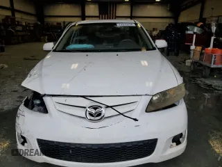 2004 Mazda 6 i with VIN 1YVFP80CX45N43521, listed as a Copart auction lot 73315234 with 182,697 mi miles and Salvage Title. Bid and sale history available at DreamBid. Image 5.