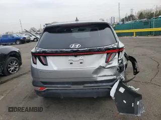 2022 Hyundai Tucson SEL with VIN 5NMJCCAE1NH034754, listed as a Copart auction lot 51097675 with 53,057 mi miles and Salvage Title. Bid and sale history available at carsss.com. Image 6.