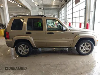 2003 Jeep Liberty Limited with VIN 1J4GK58K63W608970, listed as a IAAI auction lot 41581379 with 220,610 mi miles and . Bid and sale history available at carsss.com. Image 14.
