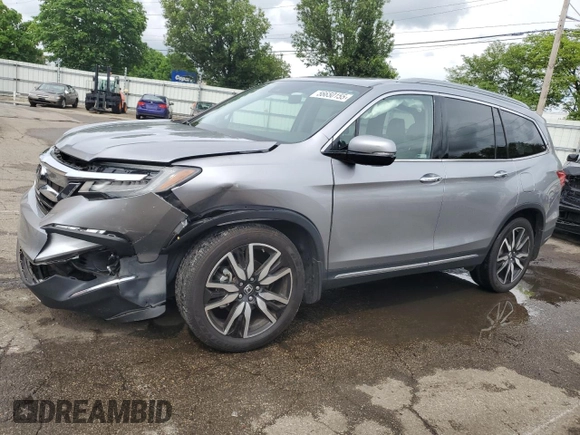 2019 Honda Pilot Touring 8-Passenger z VIN 5FNYF5H91KB033661, wystawiony jako Copart lot #56650155 z przebiegiem 73 512 mil mil oraz Szkoda całkowita • Salvage title. Historia ofert i sprzedaży dostępna na DreamBid. Obrazek 1.
