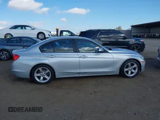 2013 BMW 3 Series 328i with VIN WBA3C1C52DF440786, listed as a IAAI auction lot 40777716 with 171,385 mi miles. Bid and sale history available at carsss.com. Image 13.