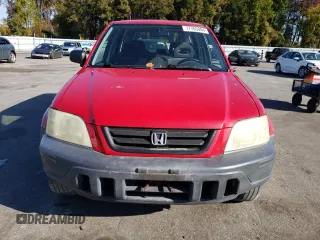 2000 Honda CR-V LX with VIN JHLRD1843YC063597, listed as a Copart auction lot 77765884 with 310,685 mi miles and Salvage Title. Bid and sale history available at carsss.com. Image 5.